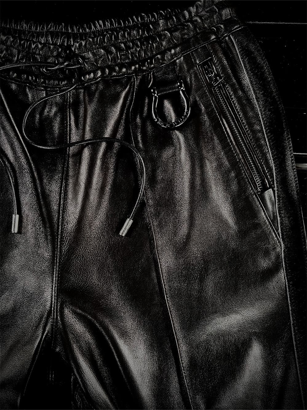 LEATHER TRACK PANTS