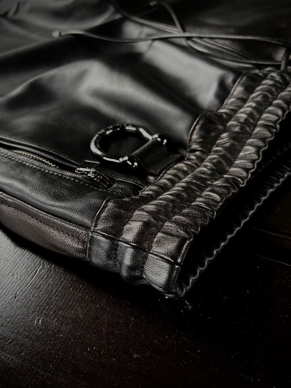 LEATHER TRACK PANTS