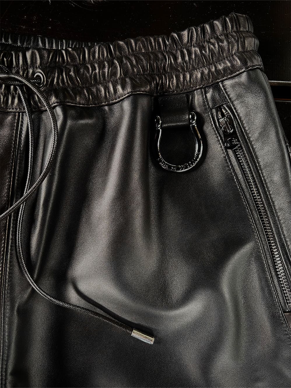 LEATHER TRACK PANTS