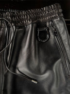 LEATHER TRACK PANTS