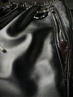 LEATHER TRACK PANTS